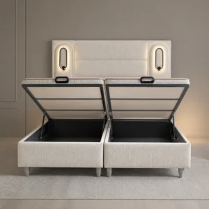 Bela Boxspringbett mit geöffnetem, zweigeteiltem Bettkasten